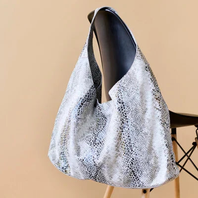 Textured leather shoulder bag by Latico Leathers
