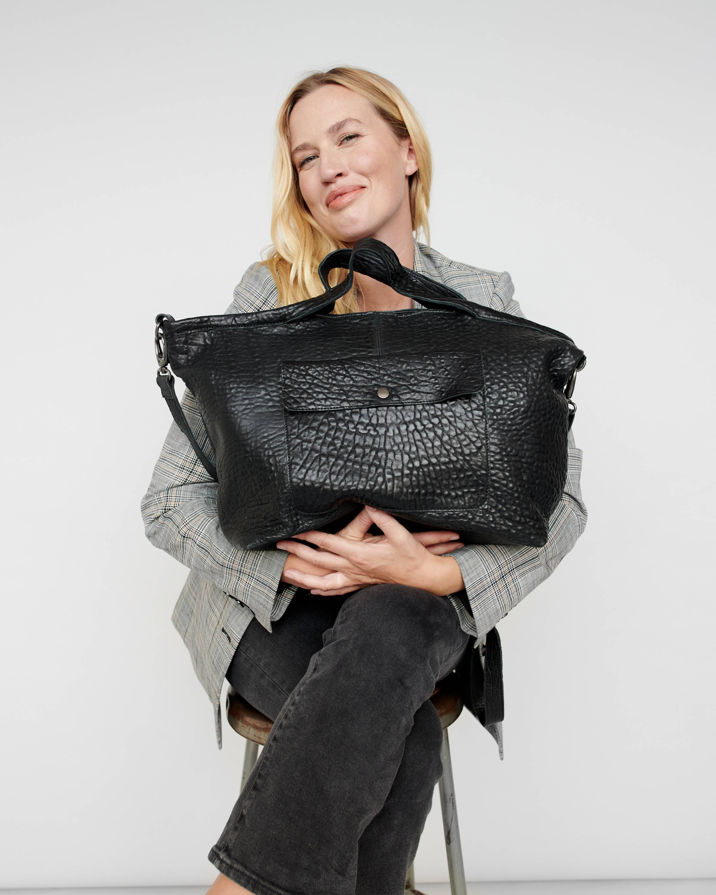 7 Timeless Black Leather Tote Bags That You'll Wear on Repeat