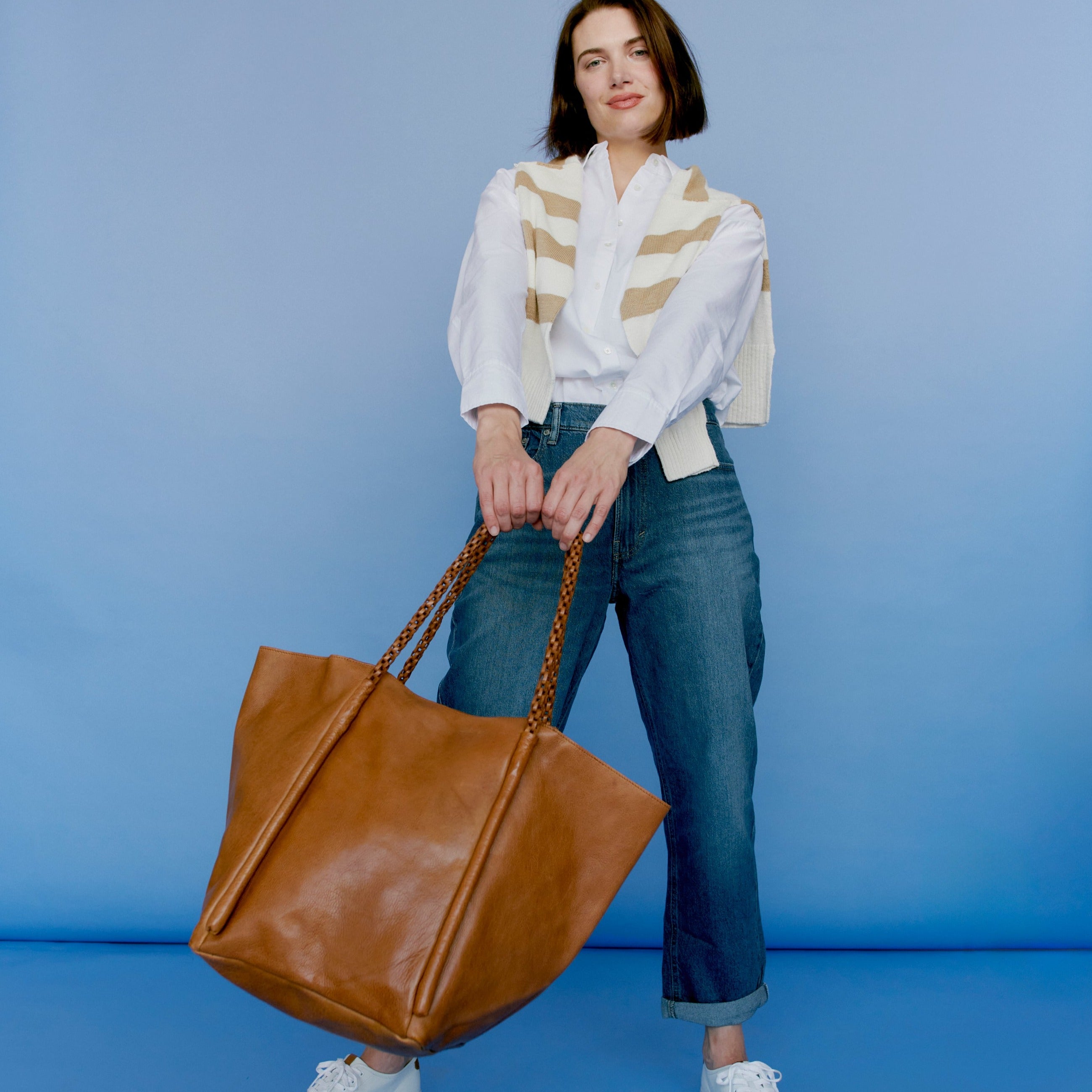 Cognac full-grain leather Voyage Lg tote bag on model by Latico Leathers