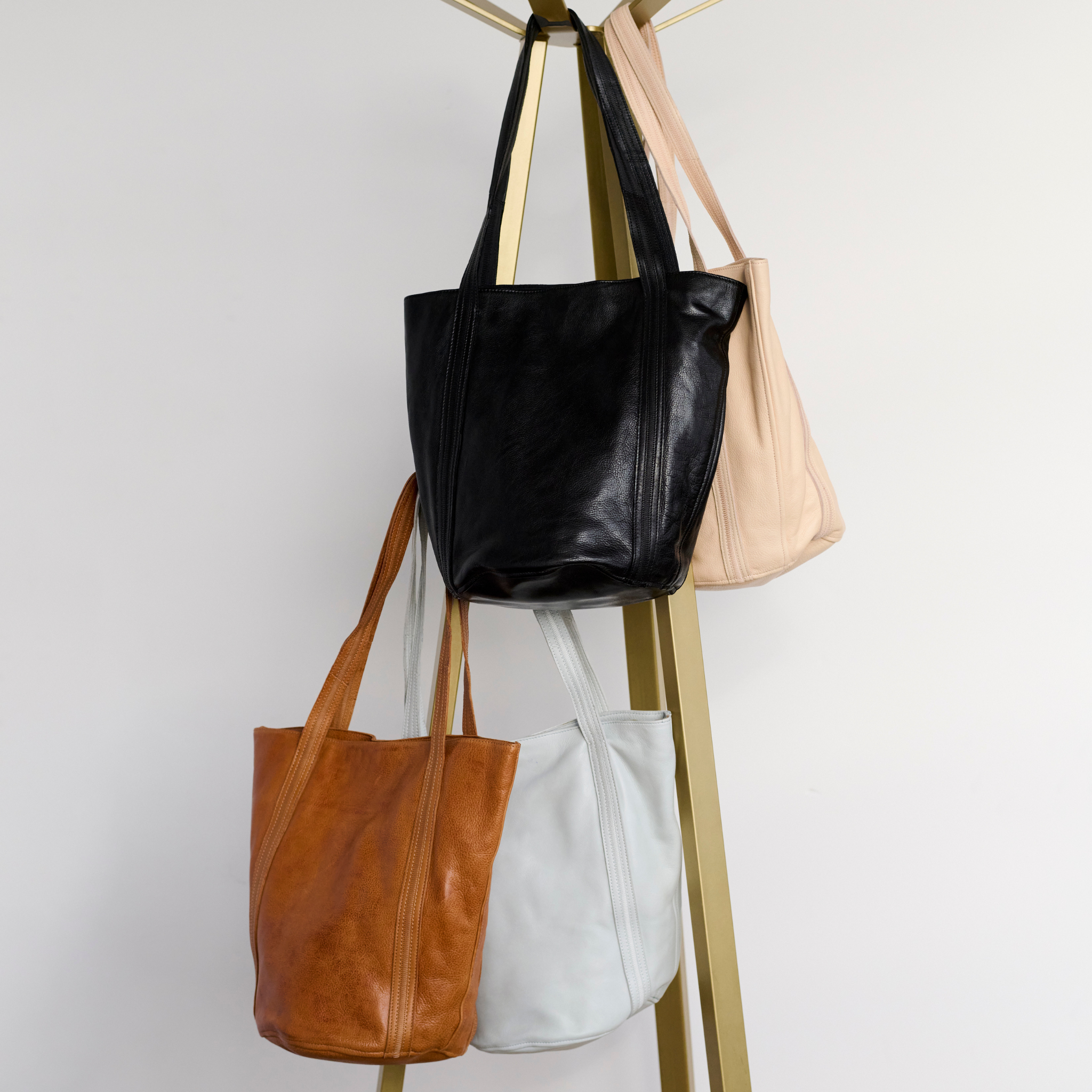 Black, Cognac, sky blue and rosa full-grain leather Kent tote bags by Latico Leathers