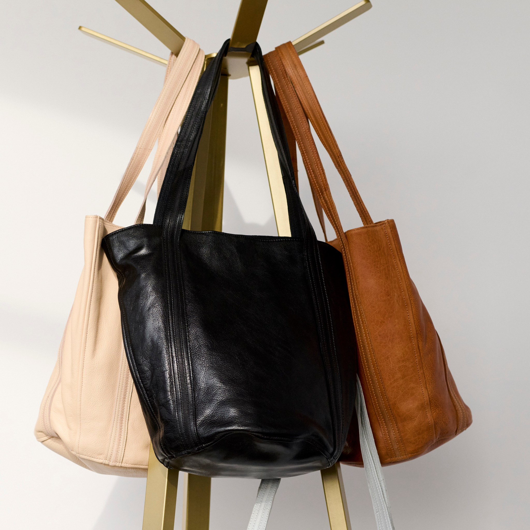 Black, Cognac, and rosa full-grain leather Kent tote bags by Latico Leathers