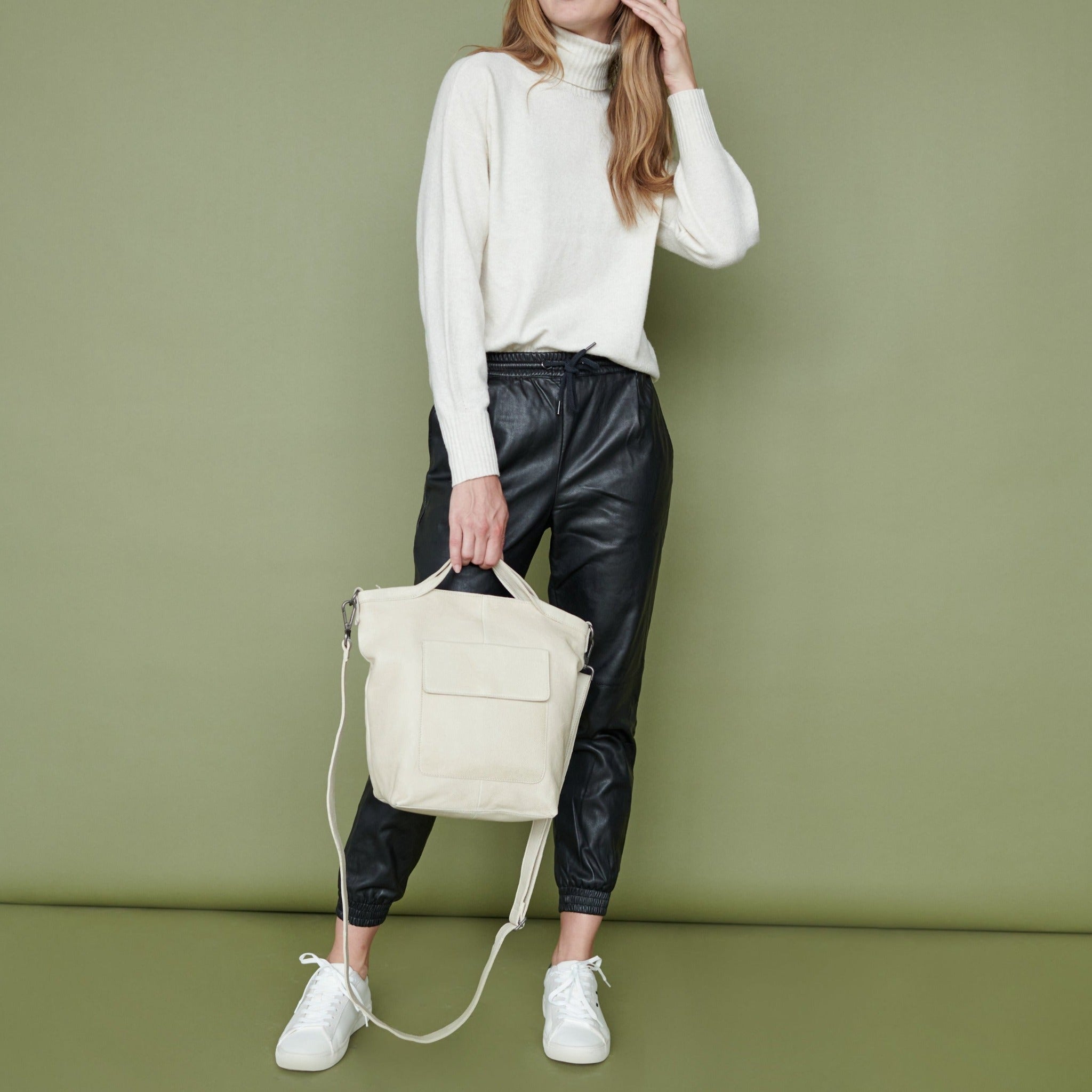 Oat full-grain leather Bianca tote crossbody bag on model by Latico Leathers