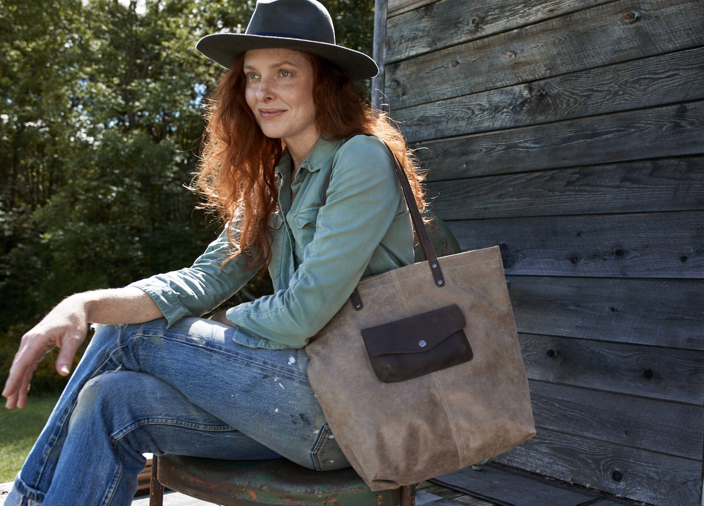 Woman using a stylish leather bag