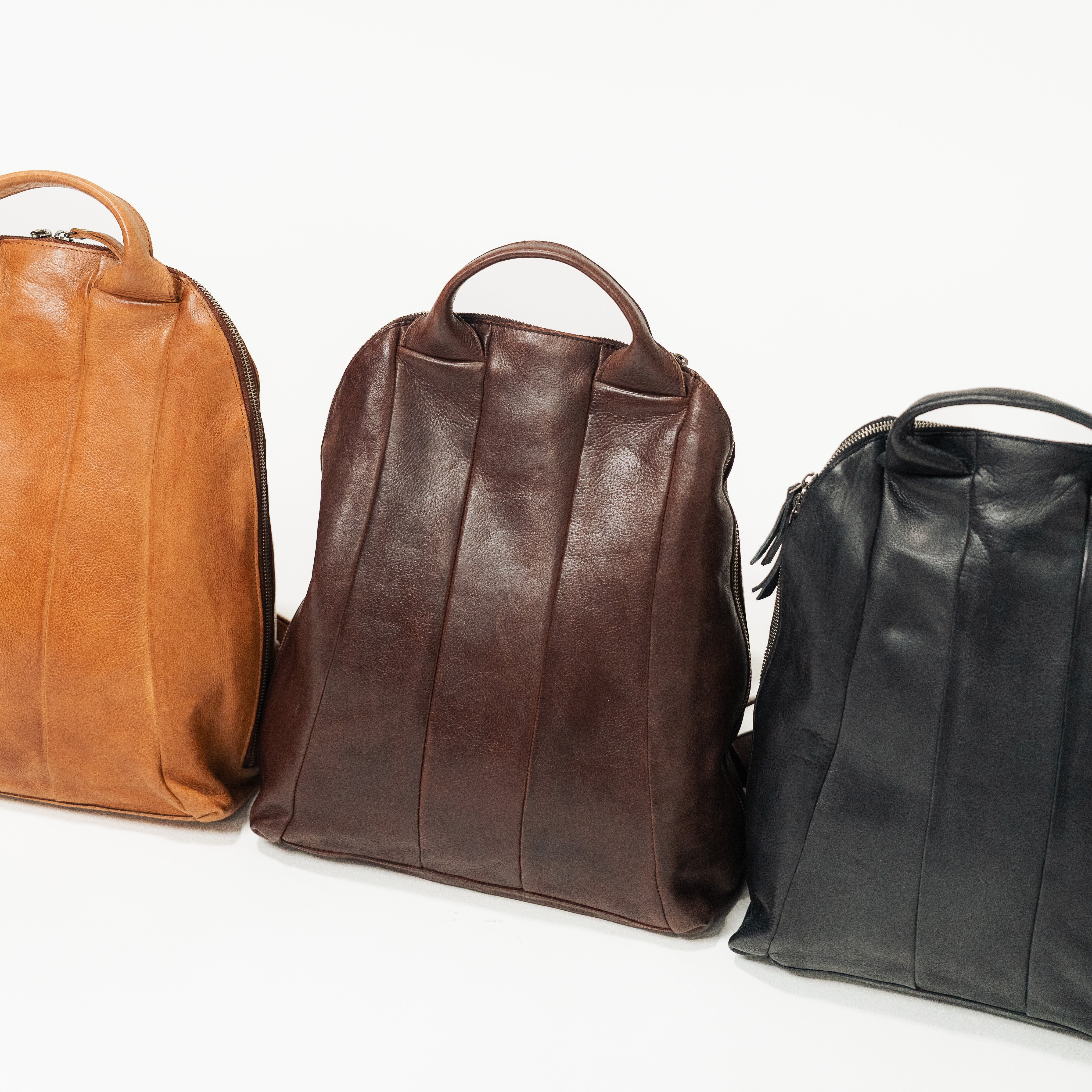 model wearing soft leather backpack