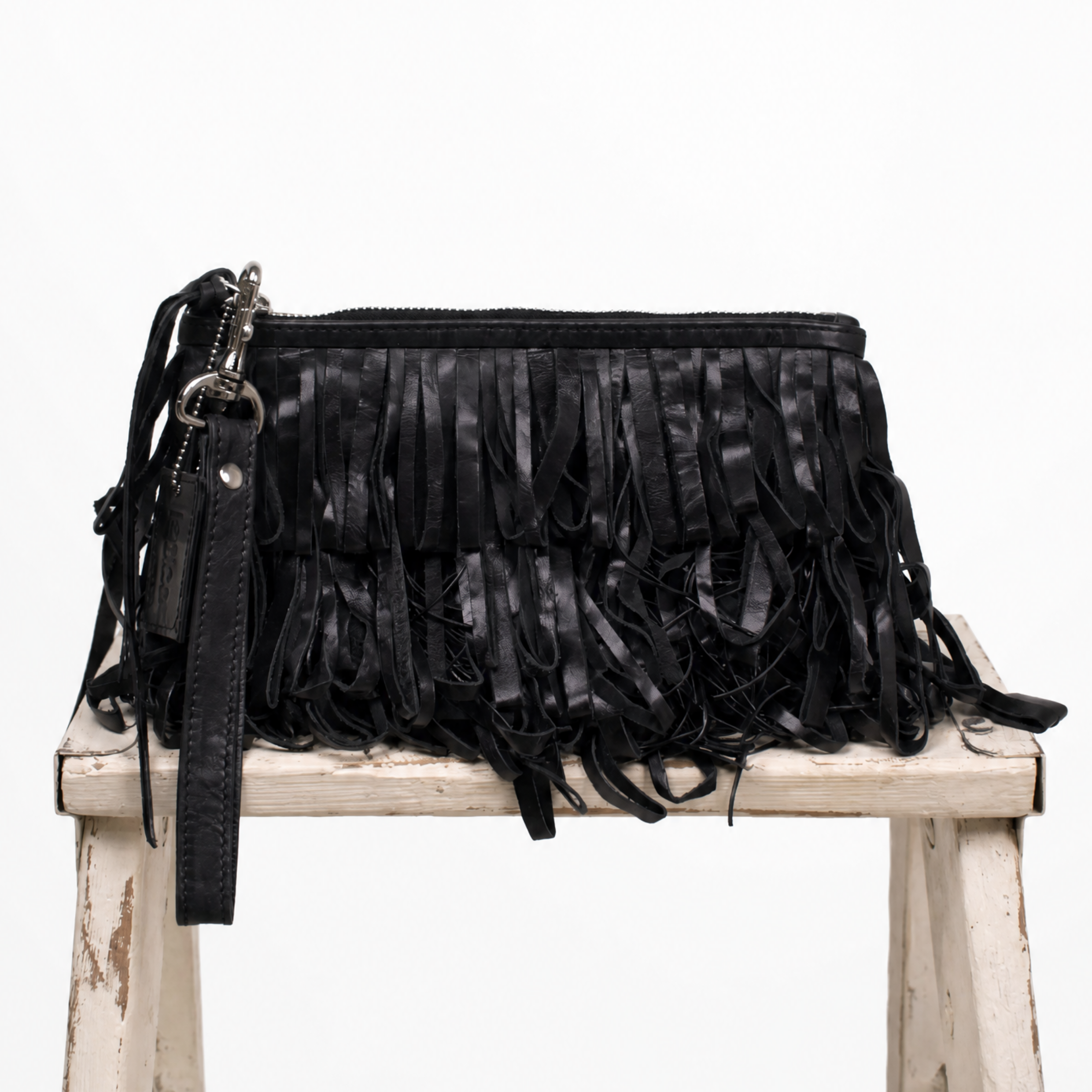 Le Cirque Fringe Wristlet in Black